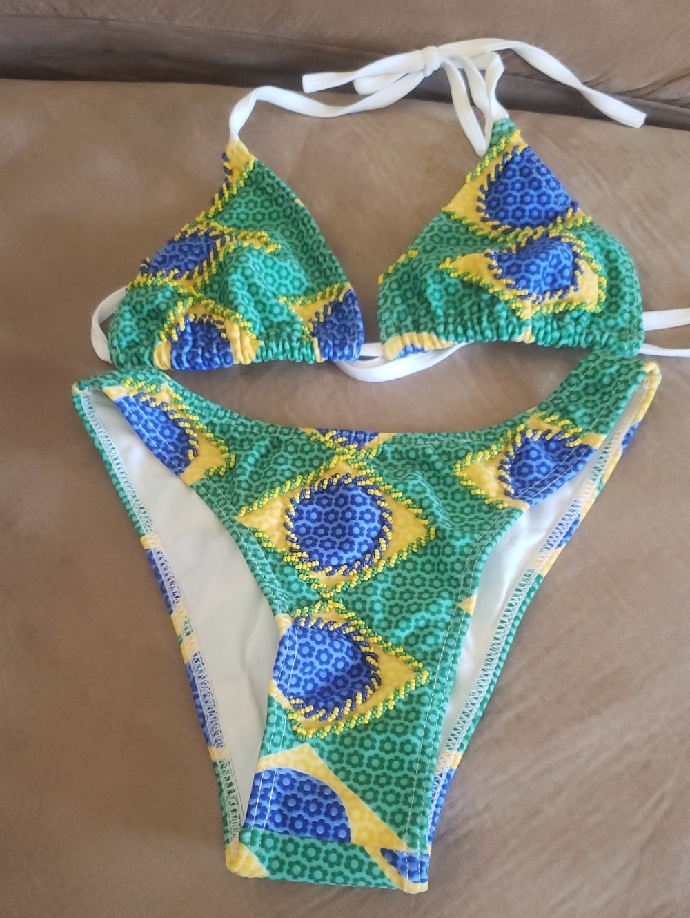 Liquido Brazilian swimwear label with green, yellow & blue trim
